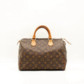 Sac Louis Vuitton Speedy 30 en toile Monogram, sac de luxe d’occasion disponible chez Sorayae
