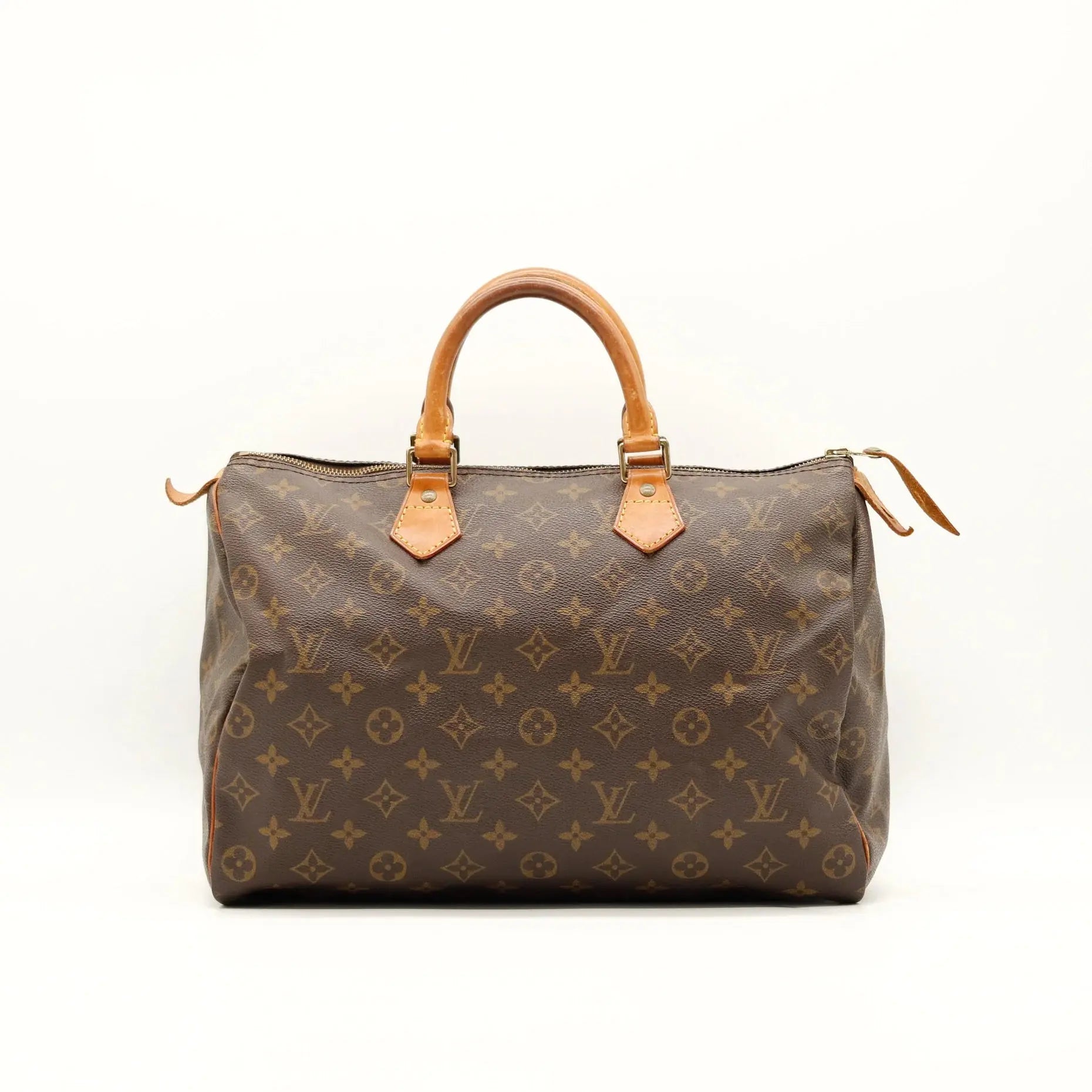 Sac Louis Vuitton Speedy 35 en toile Monogram, sac de luxe d’occasion authentique disponible chez Sorayae.
